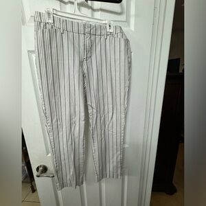 White pants with black stripes. Great for work and day to day wear.